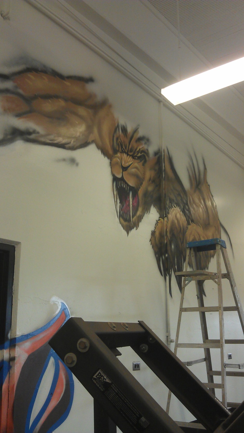 in progress saber spray painting